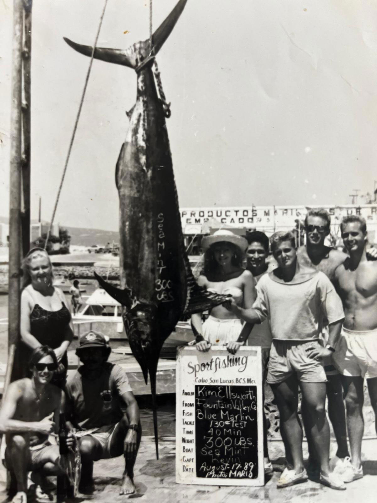 With a 300-pound Blue Marlin caught 8 miles offshore while trolling with an 80-pound line, Cabo San Lucas, Mexico ----